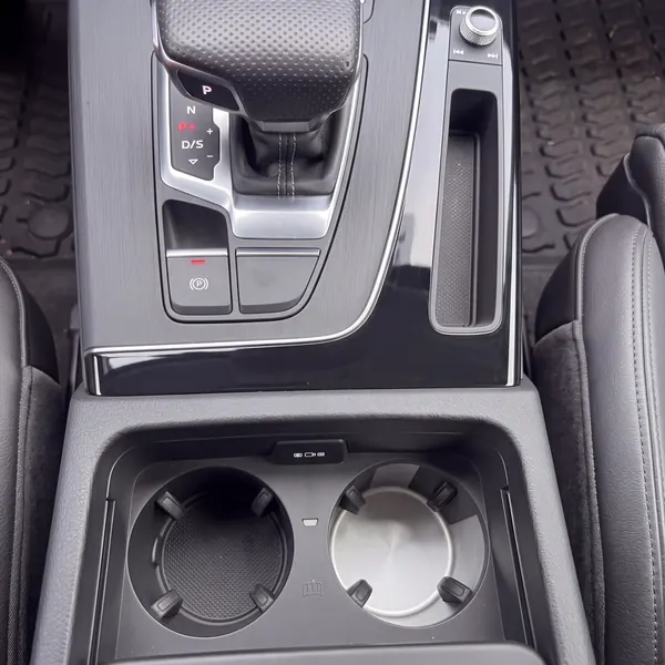 After: Audi Q5 cup holders and console, coffee stains and crumbs before, clean after